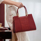 The Perfect Fashion Choice For Sophisticated Women A High-end Red Handbag
