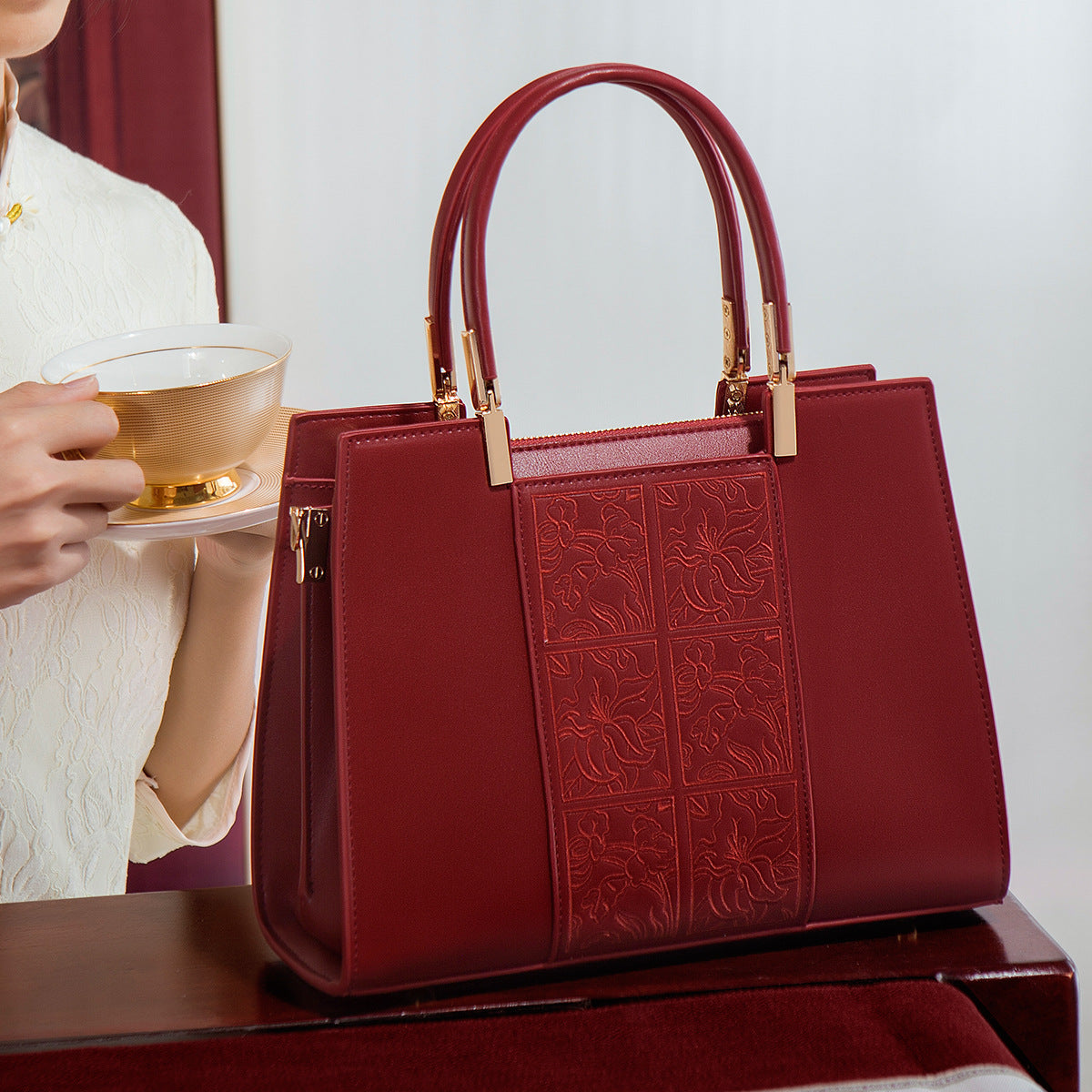 The Perfect Fashion Choice For Sophisticated Women A High-end Red Handbag